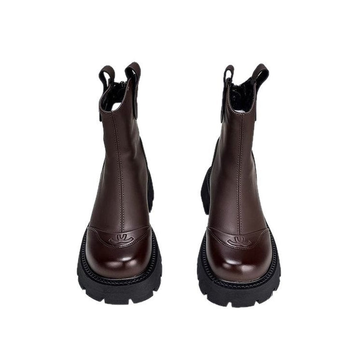 Dunkelbraune Chelsea-Boots mit geprägtem Vorderteil und robuster Sohle