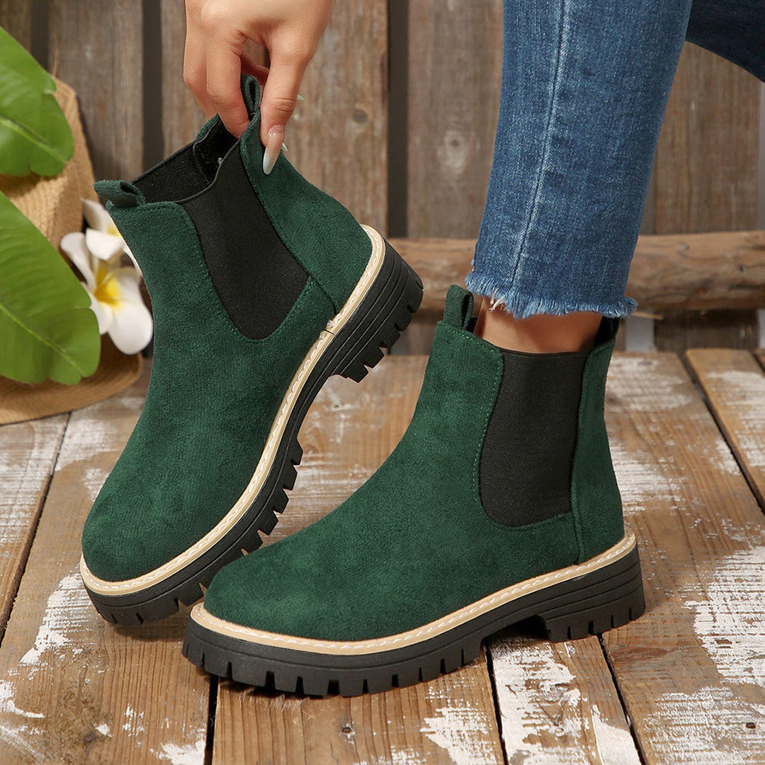 Dunkelgrüne Chelsea-Boots mit griffiger Plateausohle
