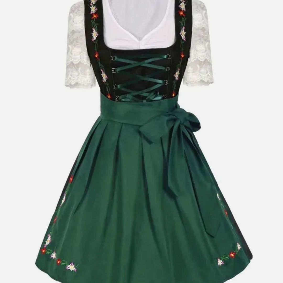 Dirndl mit grüner Schürze, schwarzem Mieder und Blumenstickerei, Spitzenbluse