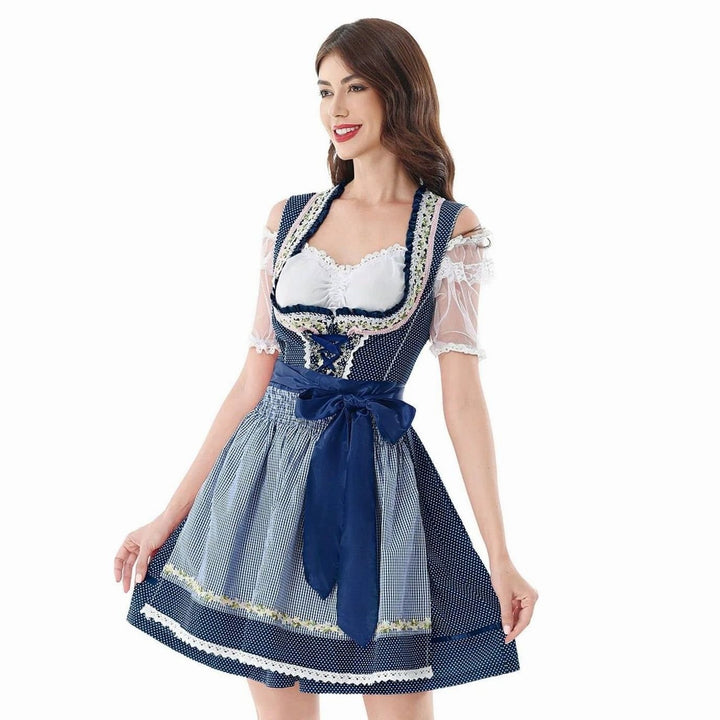 Nahaufnahme Dirndl-Oberteil mit Schnürung, Blumenborte und transparenten Puffärmeln