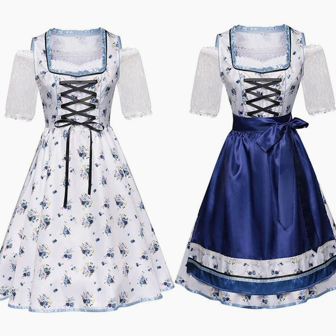 Trachtenkleid mit Blumenmuster kombiniert mit dunkelblauer Schürze im Vergleich