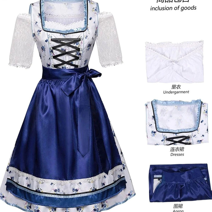Dirndl-Set mit Blumenmuster, Spitzenbluse und blauer Schürze im Detail