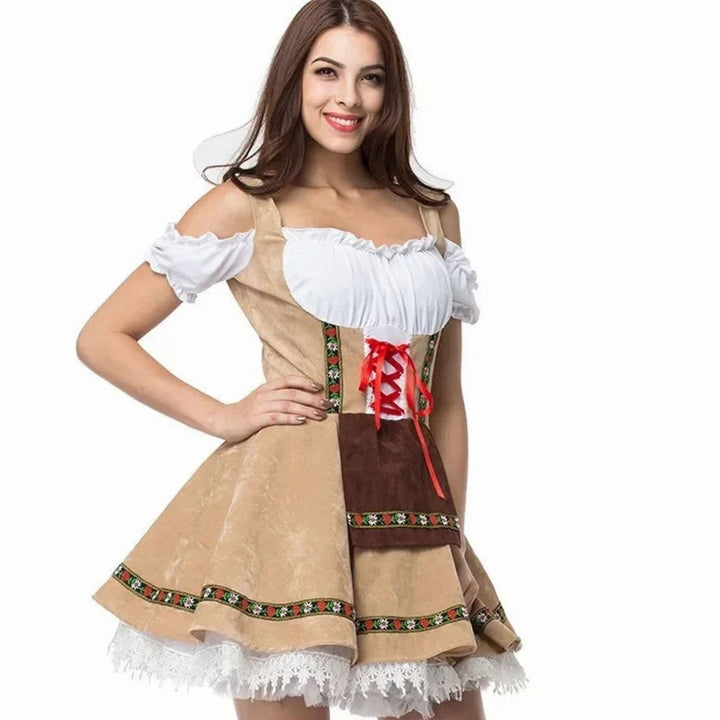 Beiges Dirndl-Kostüm mit weißer Bluse und roter Schnürung im Miniformat