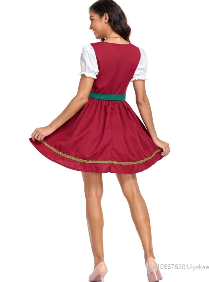 Rückansicht des Dirndl Minikleids mit Puffärmeln und grünem Taillenband
