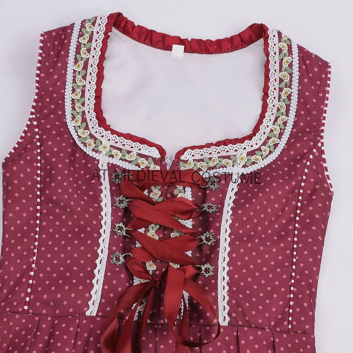 Nahaufnahme Dirndl-Mieder mit Schnürung und floraler Spitzenbordüre
