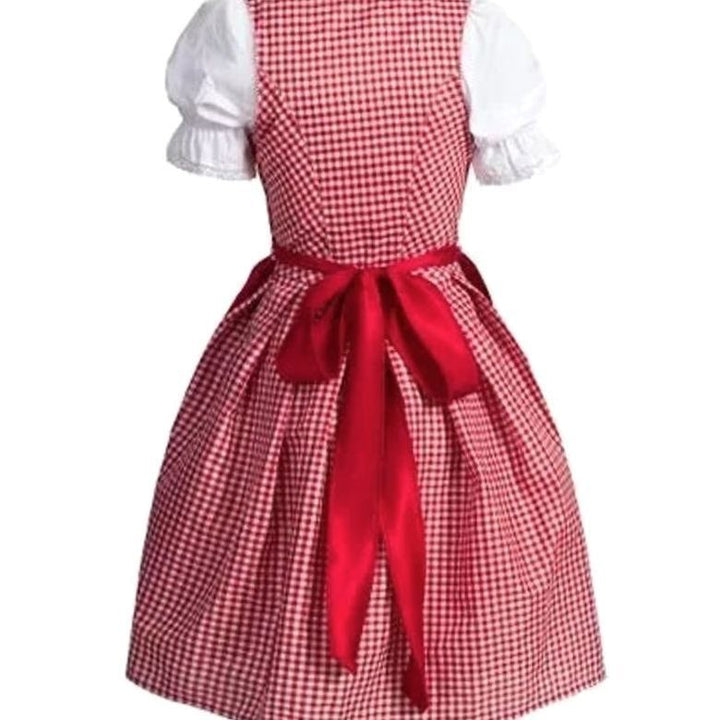Rückansicht des karierten Dirndlkleids mit rotem Schleifenband und Puffärmelbluse