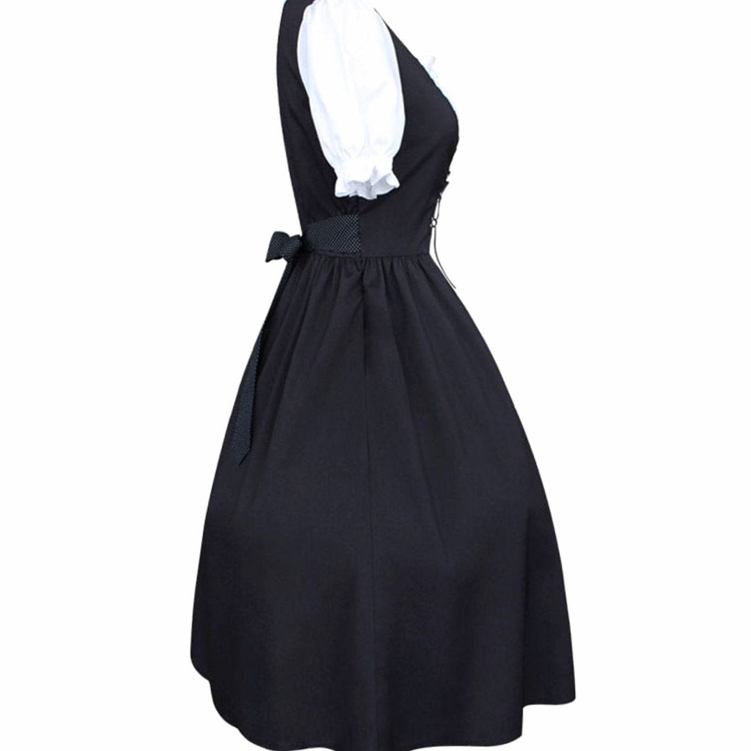 Trachtenkleid schwarz mit weißen Puffärmeln, seitliche Ansicht mit Schleife