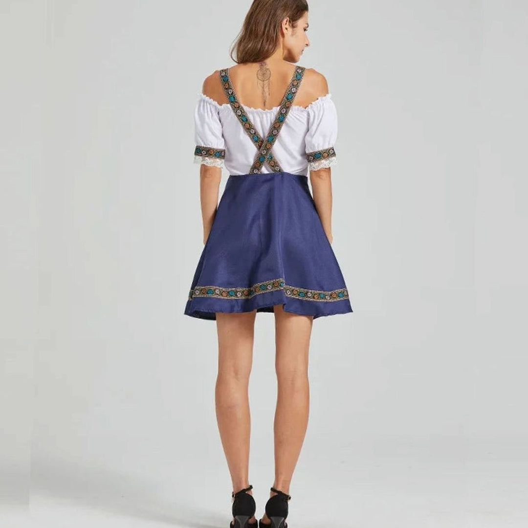 Rückansicht des Dirndl-Trägerrocks mit gekreuzten bestickten Trägern in Marineblau