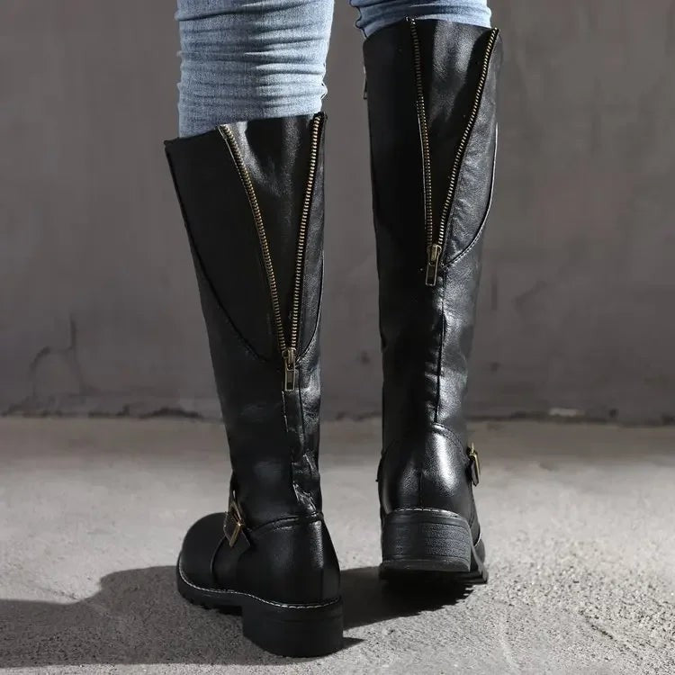 Schwarze Kniehohe Lederstiefel mit goldenem Reißverschluss und Blockabsatz