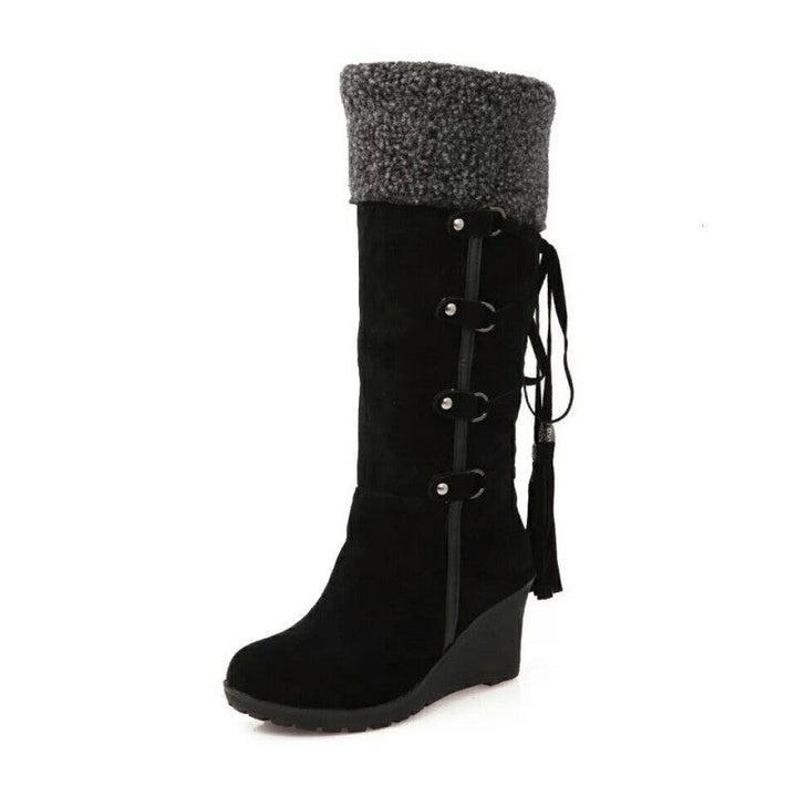 Schwarzer Wildleder-Keilstiefel mit grauem Fellumschlag und Quasten