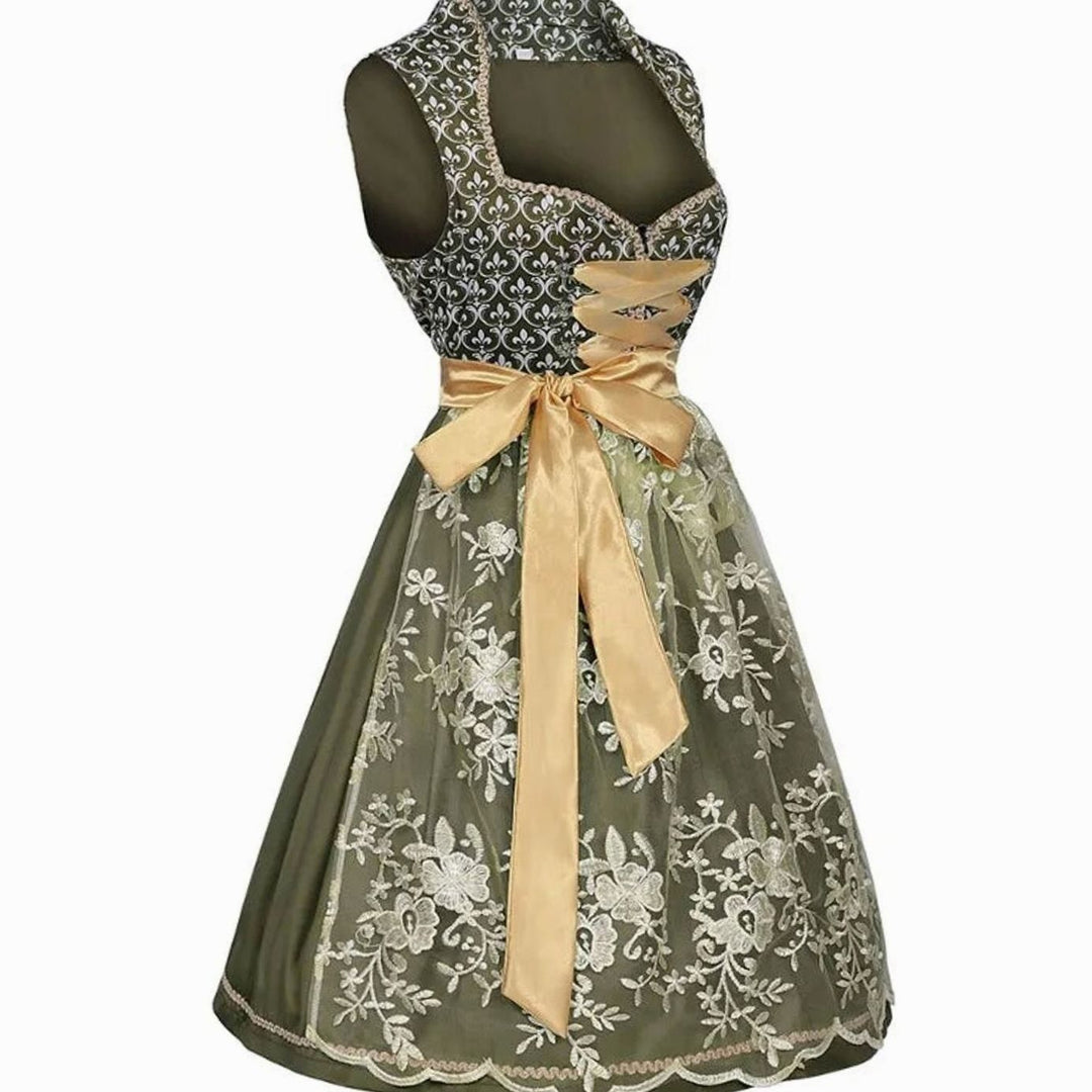 Dirndl in Olivgrün mit Herzausschnitt, Spitzenschürze und goldener Schleife