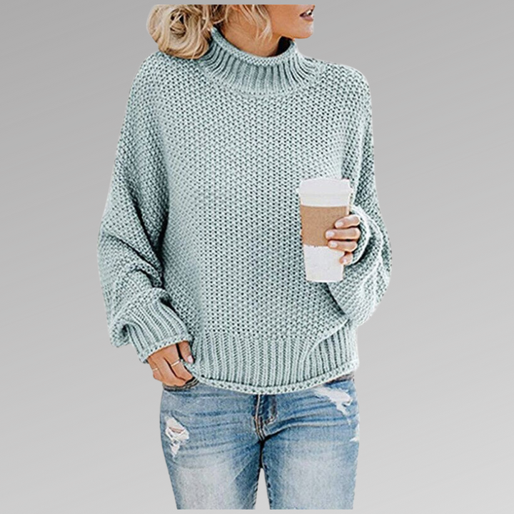 Mintgrüner Strickpullover mit Stehkragen und oversized Silhouette