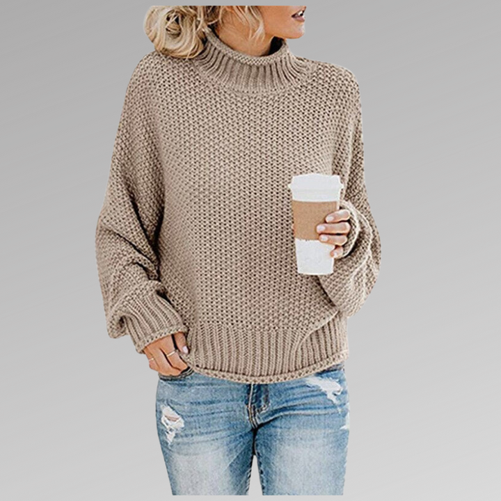 Beiger Strickpullover mit Stehkragen und weiten Fledermausärmeln