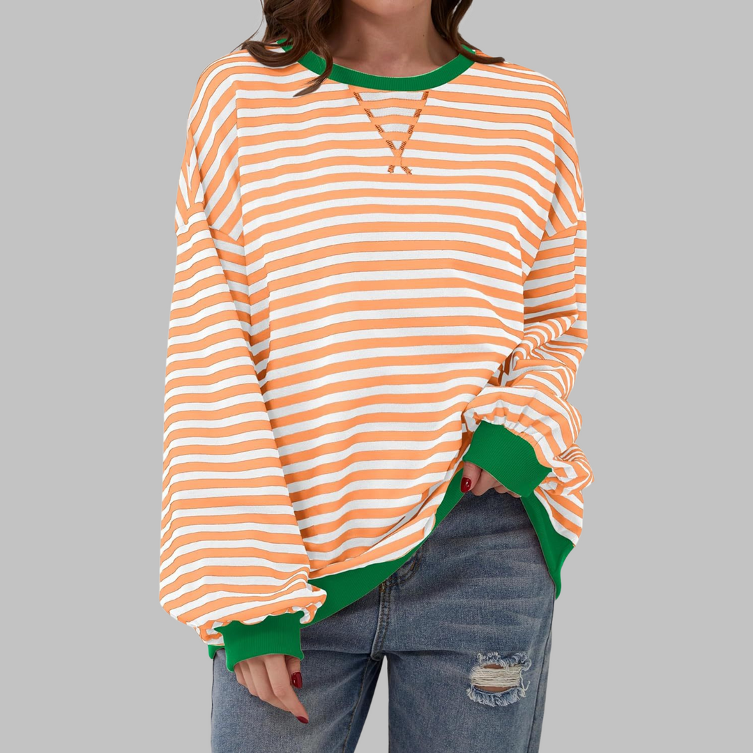 Oversize-Sweatshirt mit orange-weißem Streifenmuster und grünem Kontrastbund