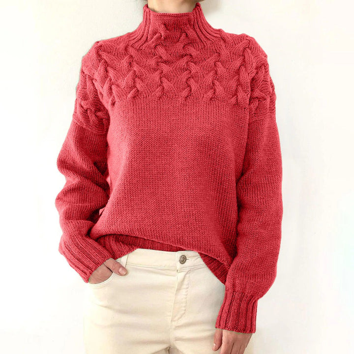 Korallenroter Rollkragenpullover mit strukturiertem Zopfstrick