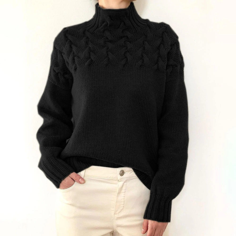 Schwarzer Strickpullover mit Rollkragen und markantem Zopfdesign