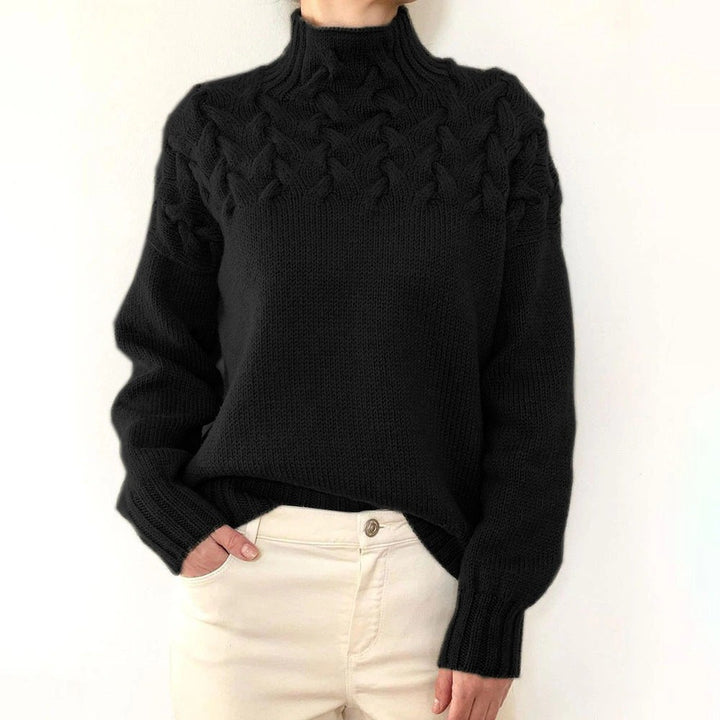 Schwarzer Strickpullover mit Rollkragen und markantem Zopfdesign