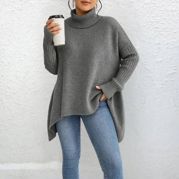 Grauer Oversize-Rollkragenpullover mit asymmetrischem Saum und Rippstrick-Ärmeln