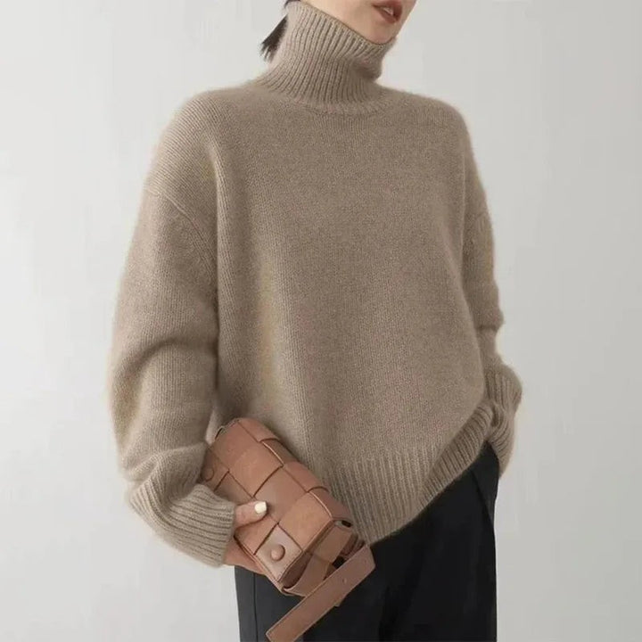 Beiger Rollkragenpullover im Oversize-Schnitt mit weiten Ärmeln