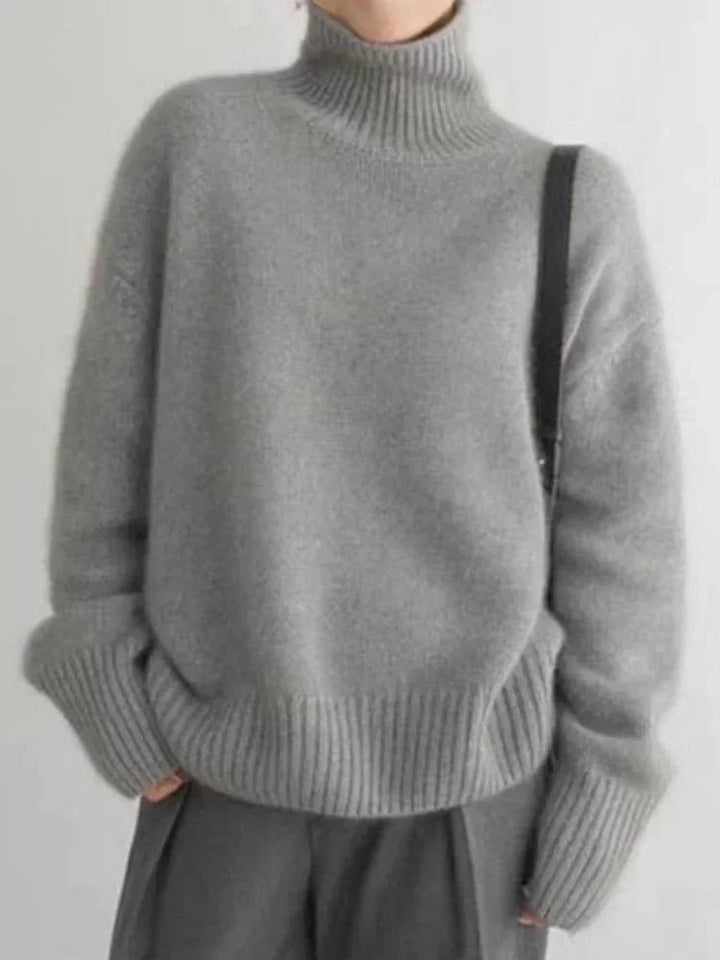 Grauer Rollkragenpullover aus Strick mit lässigem Oversize-Look