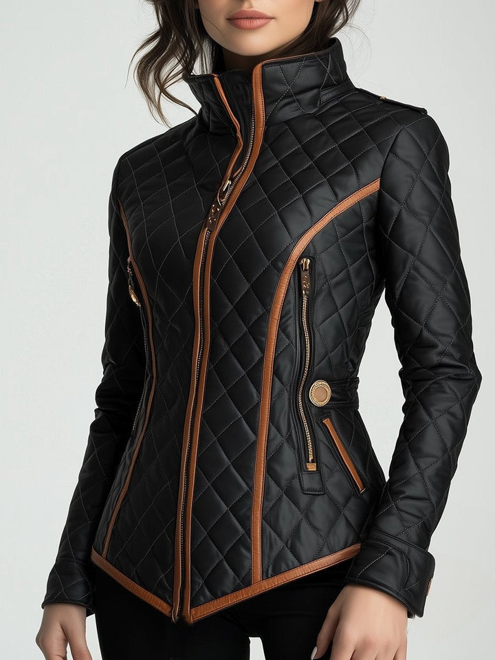 Wattierte Steppjacke in Schwarz mit goldenen Reißverschlüssen und Kontrastpaspel