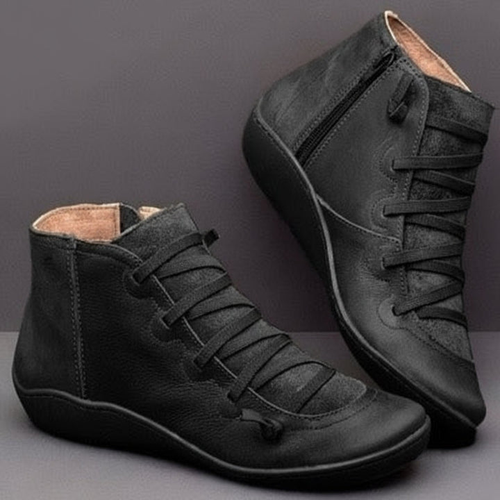 Schwarze Stiefelette aus Leder mit Kreuzschnürung, Paaransicht