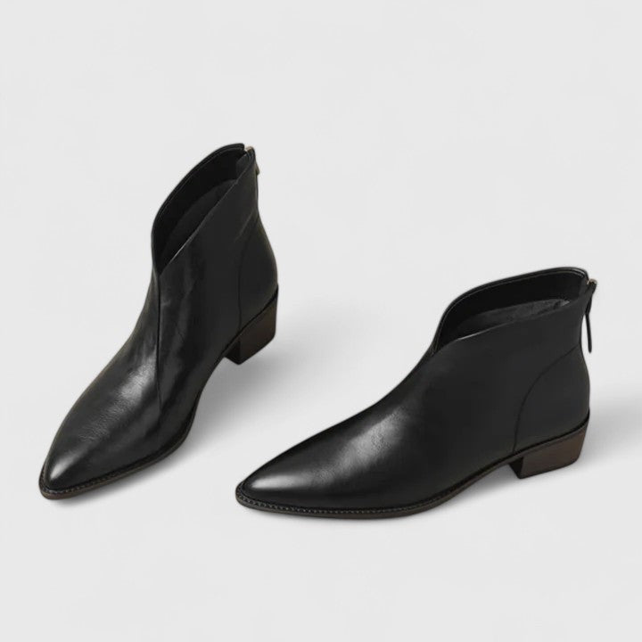 Schwarze Lederstiefeletten mit spitzer Zehenform und Blockabsatz