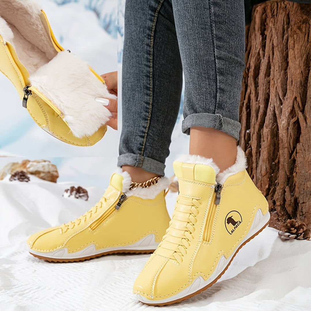 Gelbe Ankle Boots mit Fellfutter und Reißverschluss, Detailansicht des Innenfutters