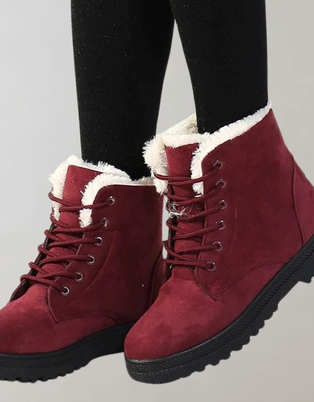 Weinrote Stiefeletten mit Kunstfellfutter und Schnürverschluss