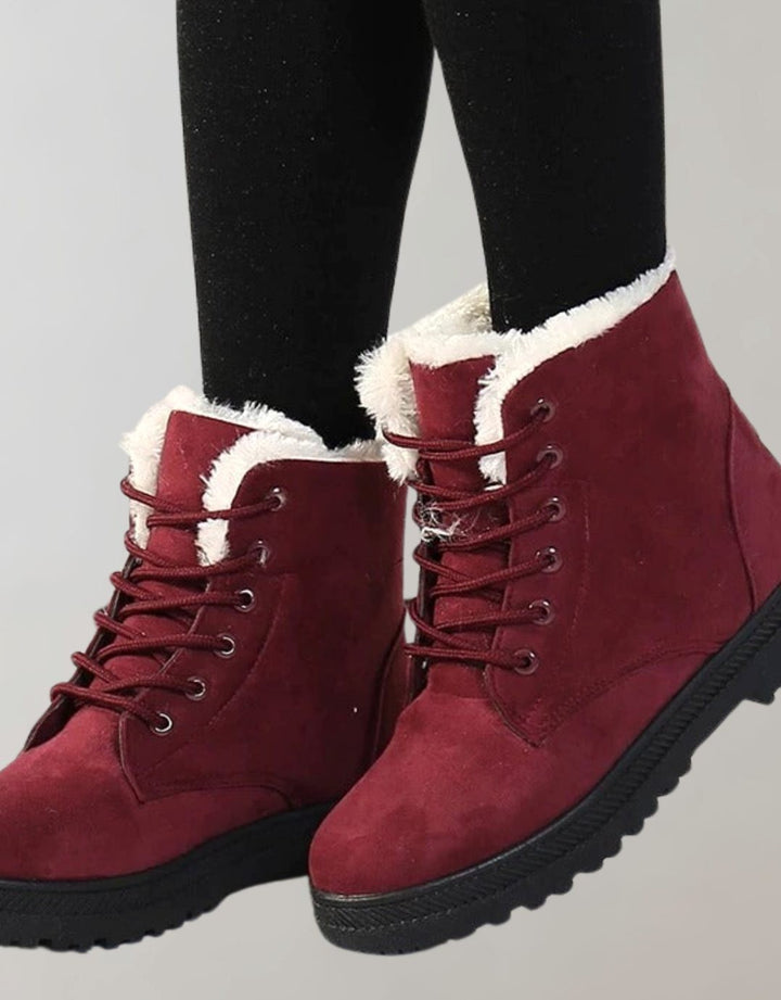 Weinrote Stiefeletten mit Kunstfellfutter und Schnürverschluss