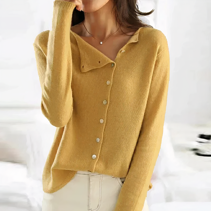Senfgelbe Bluse mit asymmetrischem Kragen und Perlmuttknöpfen, langärmelig