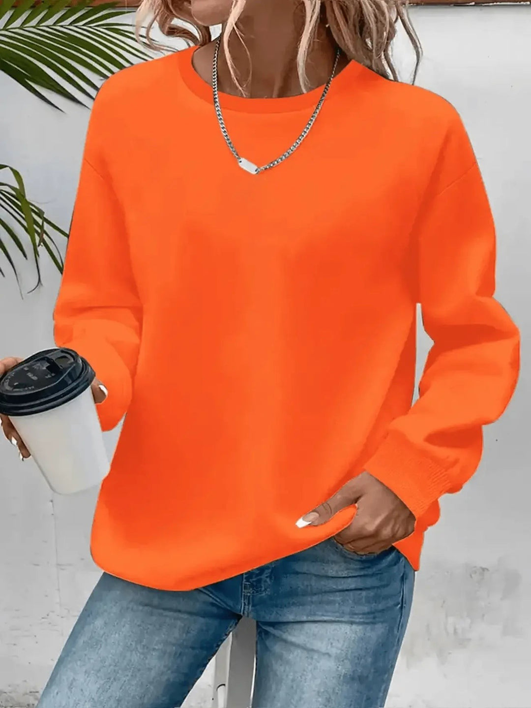 Oranges Sweatshirt mit gerippten Bündchen und lockerer Passform