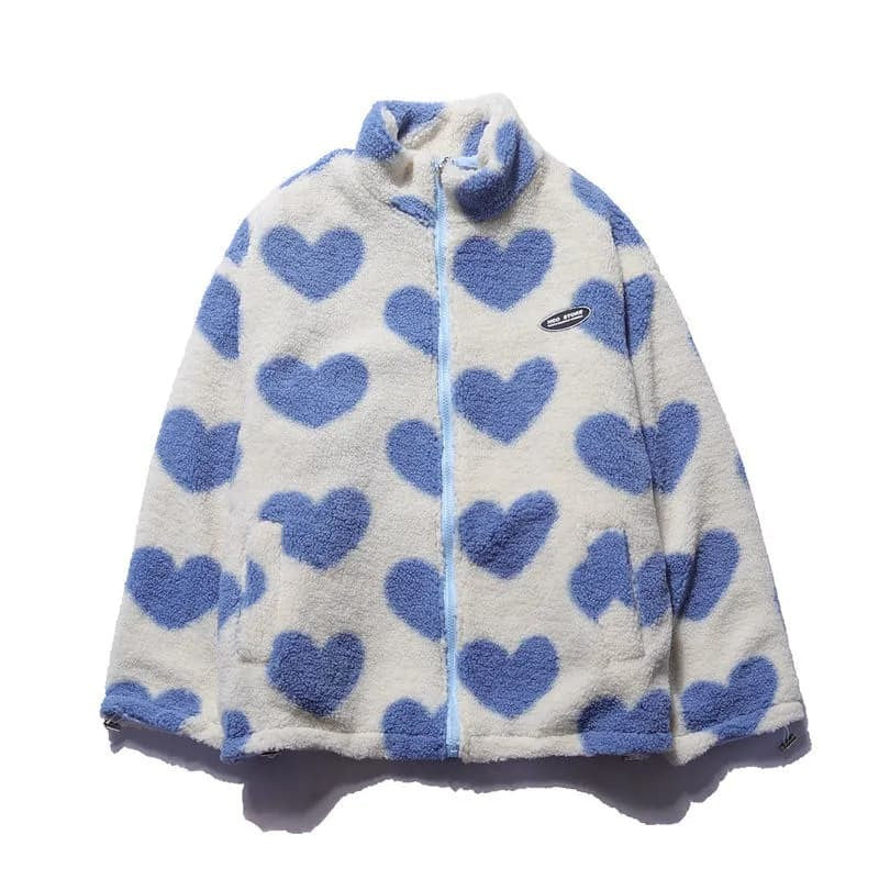 Flauschige Fleecejacke in Creme mit blauem Herzmuster und Reißverschluss