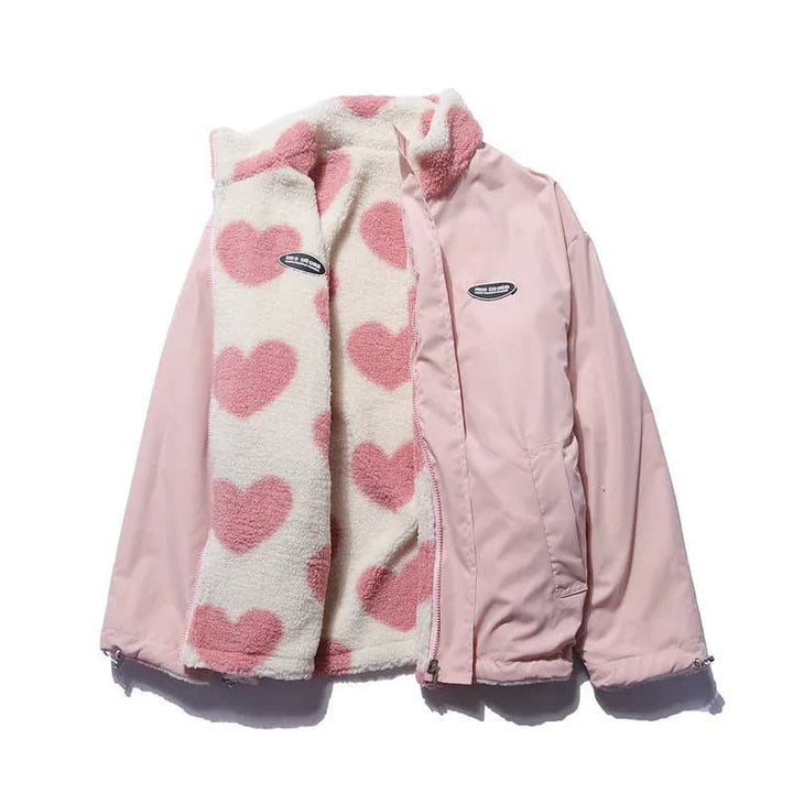 Wendejacke in Rosa mit Herzmuster-Fleece, offen präsentiert