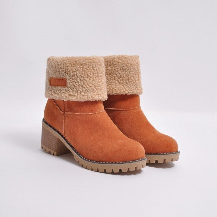 Orange Wildleder-Boots mit beigem Fellumschlag und rutschfester Sohle