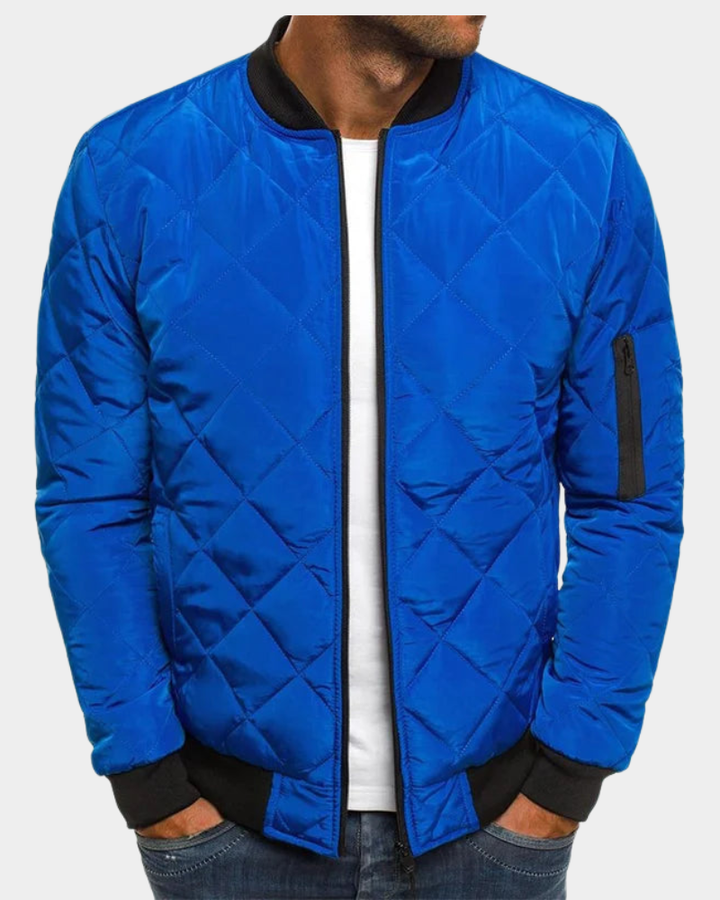 Blaue Steppjacke im Bomberstil mit schwarzem Rippkragen