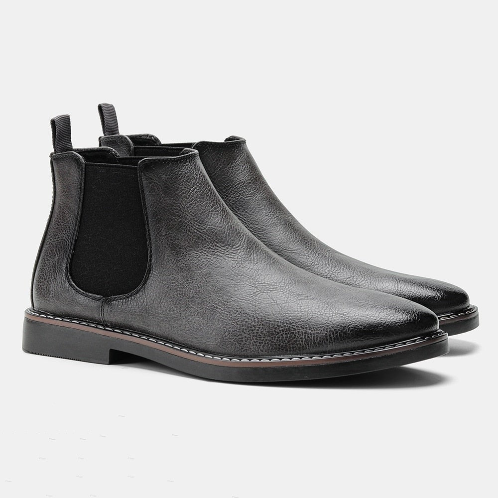 Schwarze Chelsea Lederstiefel mit elastischem Seitenteil und Zughenkel