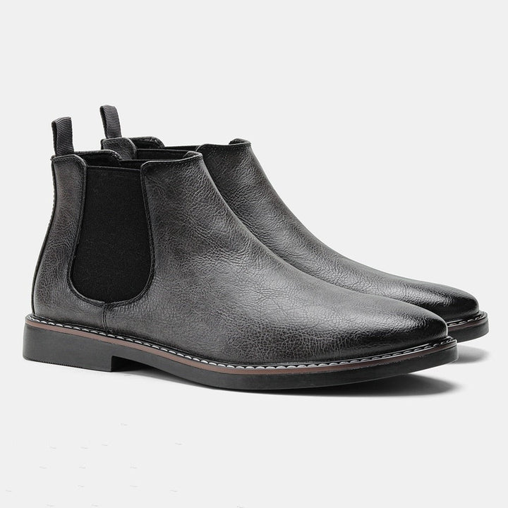 Schwarze Chelsea Lederstiefel mit elastischem Seitenteil und Zughenkel