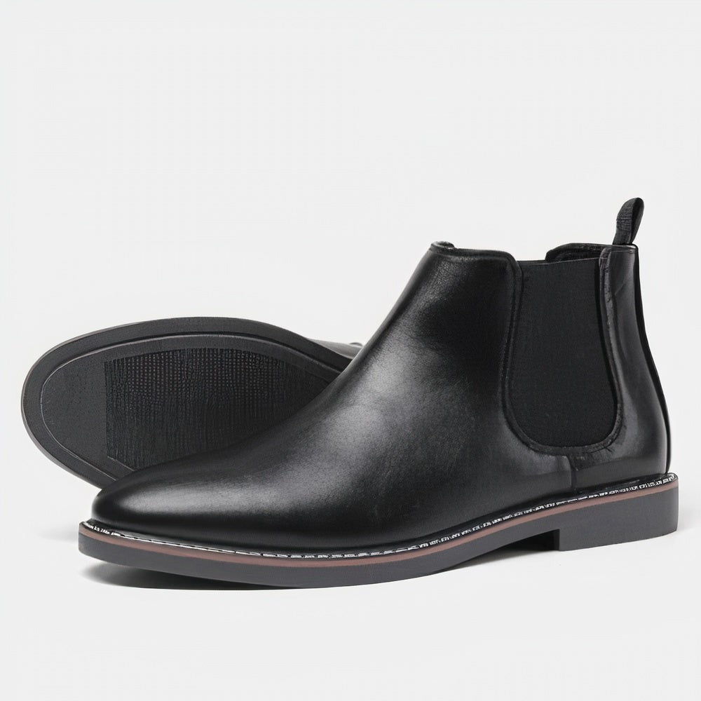 Schwarze glänzende Lederstiefel im Chelsea-Stil mit dezenter Profilsohle