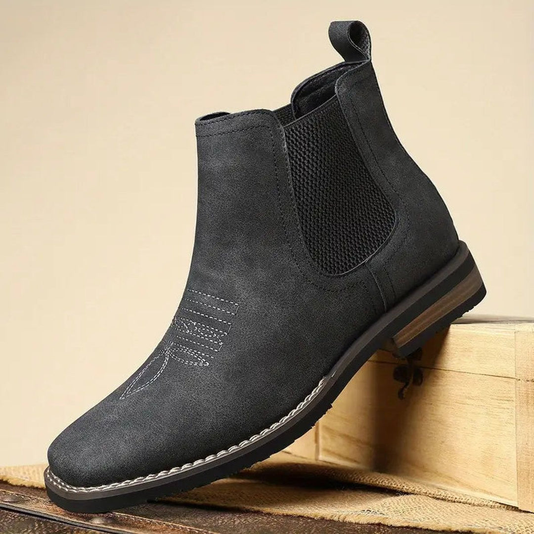 Schwarze Chelsea Boots Herren, seitliche Detailansicht der Naht
