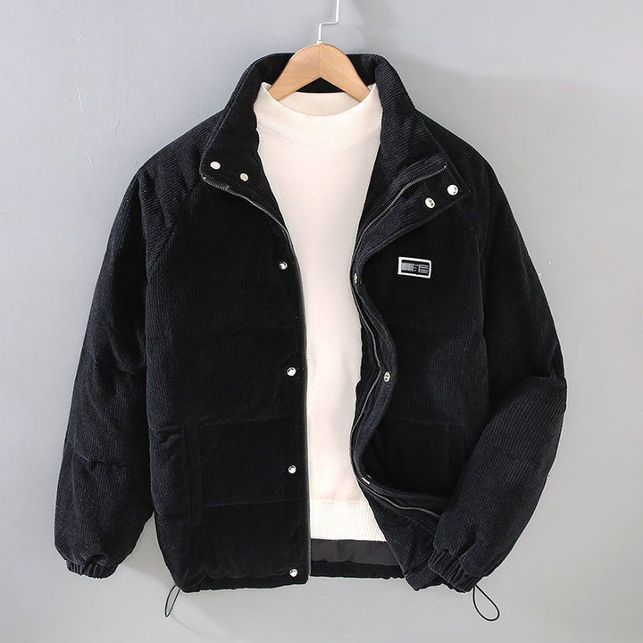 Schwarze gepolsterte Cordjacke mit Stehkragen und elastischen Bündchen