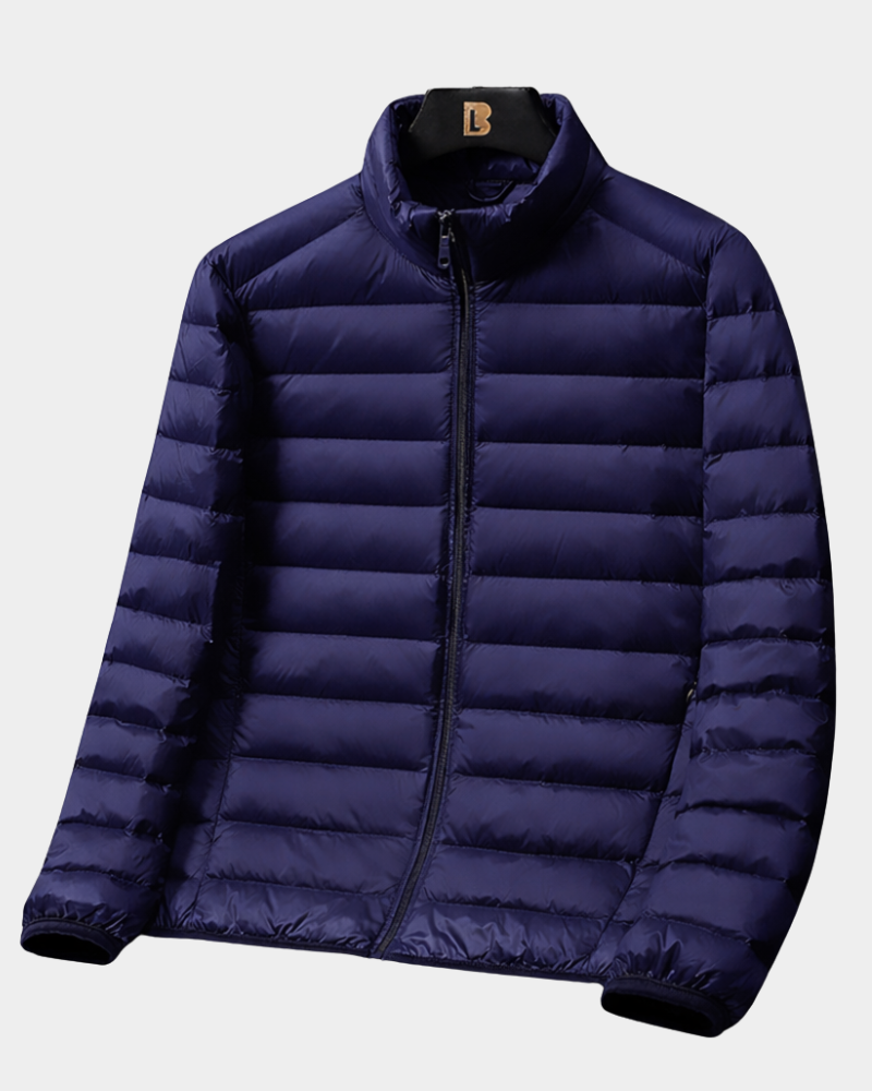 Dunkelblaue leichte Daunenjacke mit schmalem Reißverschluss und Steppmuster