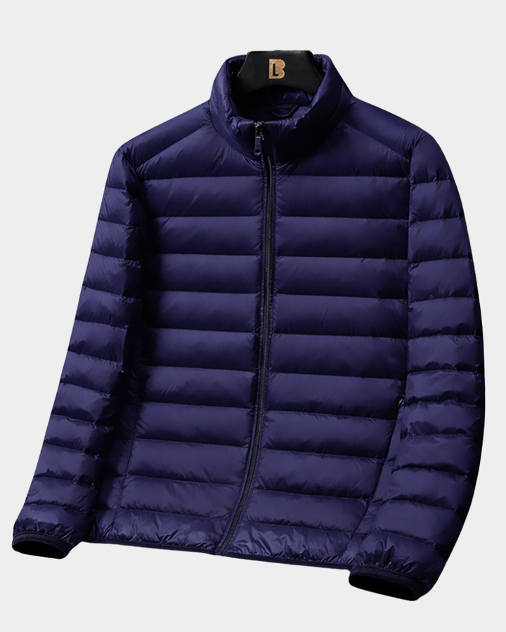 Dunkelblaue leichte Daunenjacke mit schmalem Reißverschluss und Steppmuster