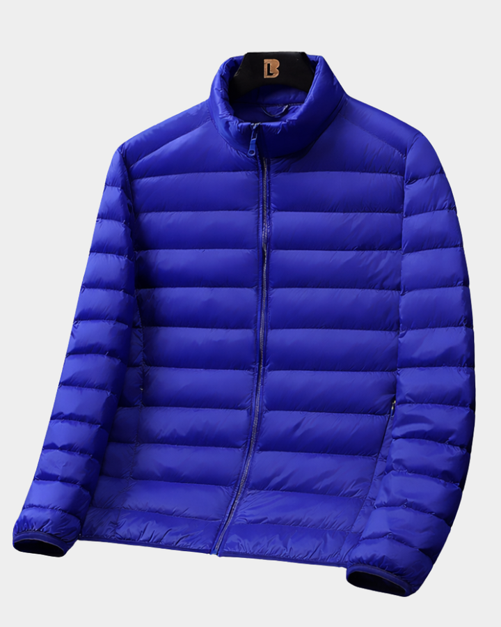 Königsblaue leichte Daunenjacke mit Stehkragen und seitlichen Taschen