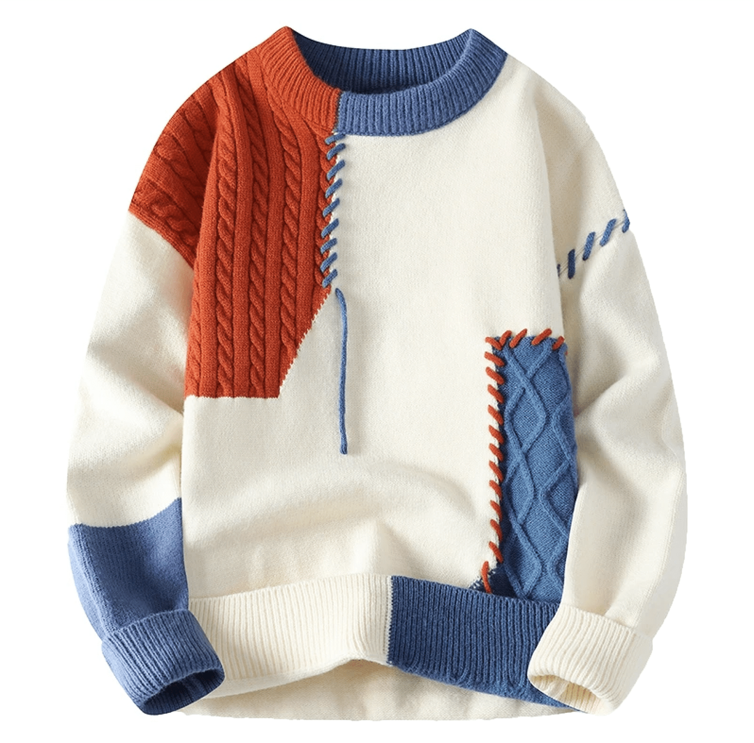 Pullover in Creme mit rotem und blauem Colorblock-Patchwork und Zopfmuster
