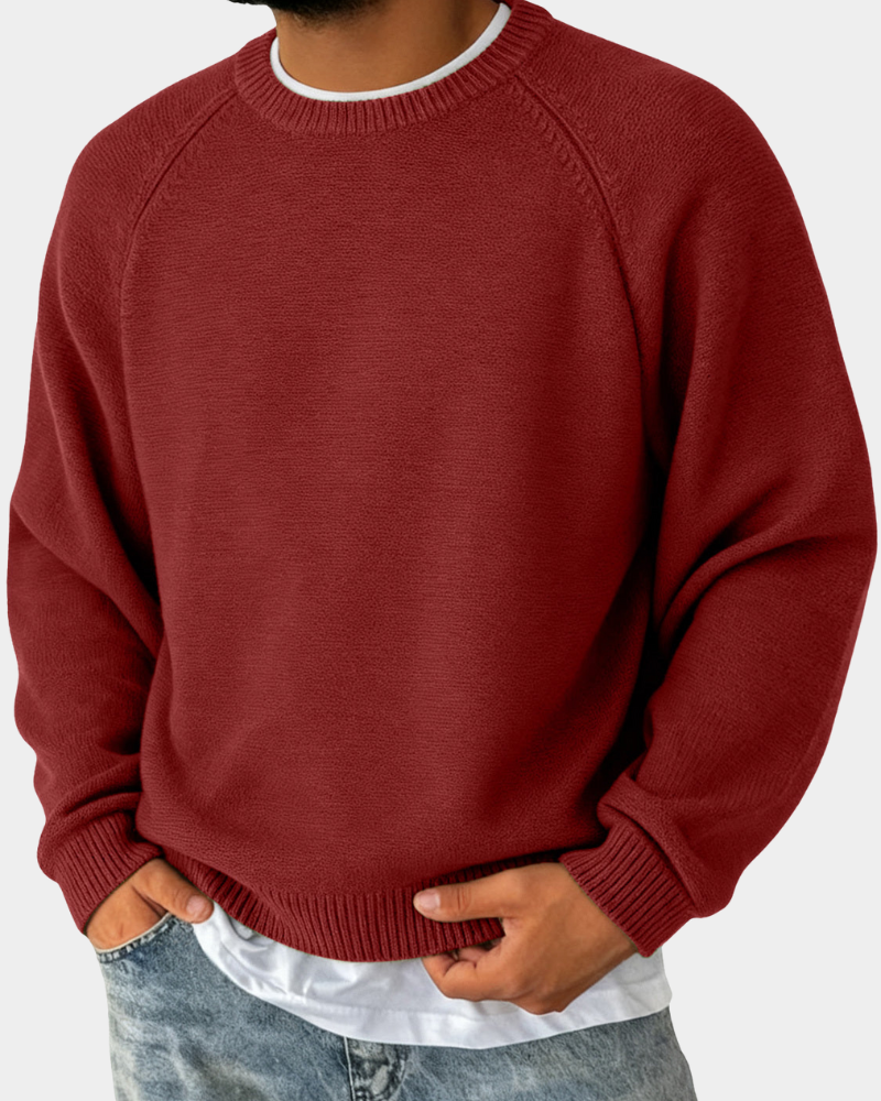 Weinroter Strickpullover mit Rippbündchen und Raglanschnitt