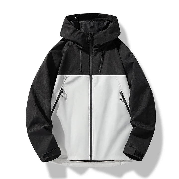 Zweifarbige Jacke in Schwarz-Weiß mit Kapuze und Kordelzug