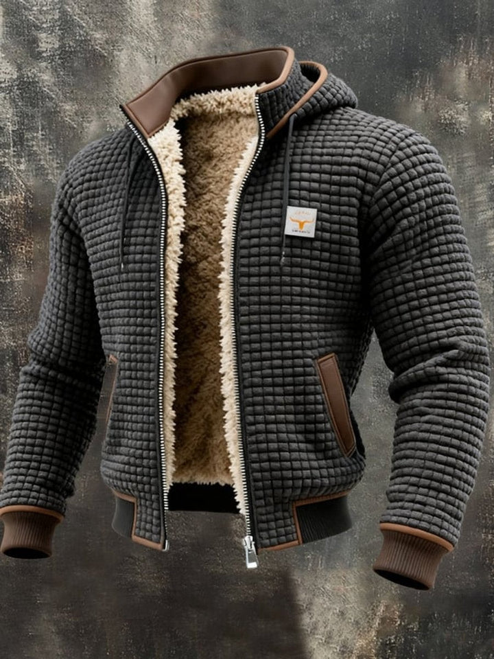 Graue Herren-Steppjacke mit Kapuze, Fellfutter und Lederbesatz