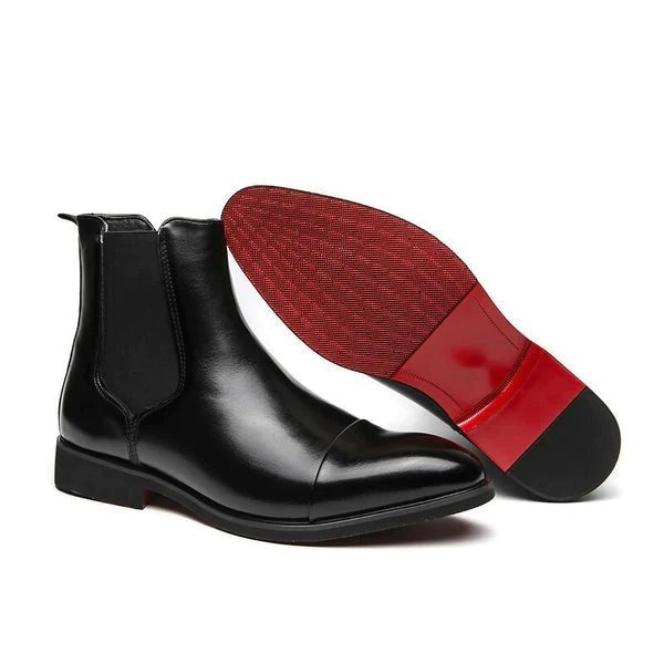 Schwarzer Chelsea Boot aus Leder mit roter Laufsohle im Detail