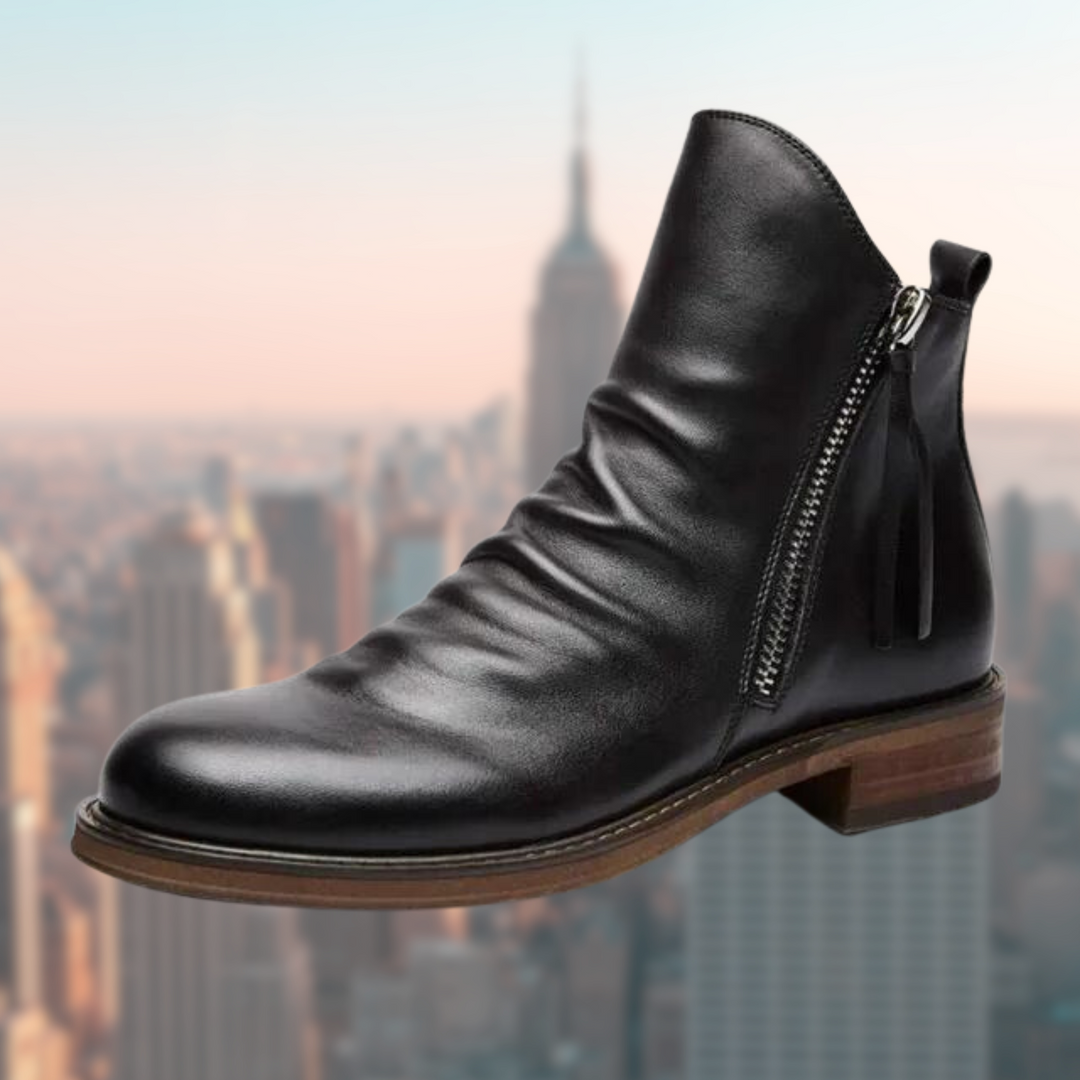 Schwarze Lederstiefelette mit Fransen-Zipper und geknitterter Optik